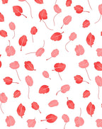 Coral Petal Scatter Across White Rug