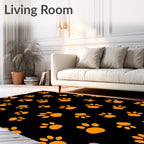 Orange Paw Prints on Black Background Rug
